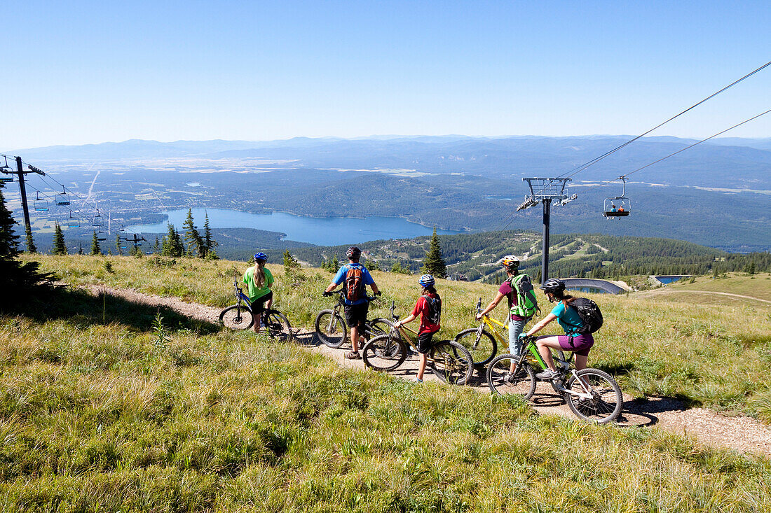 A family rides their bikes in Whitefish, Montana.