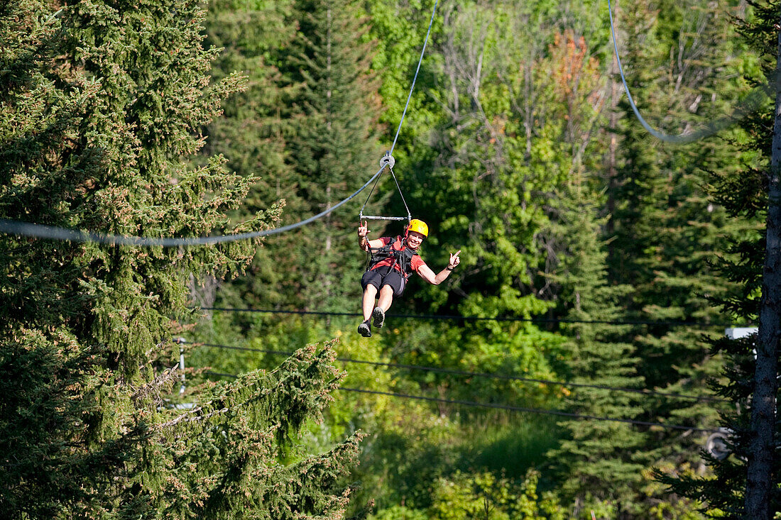 A woman on a zip line in Whitefish, Montana.