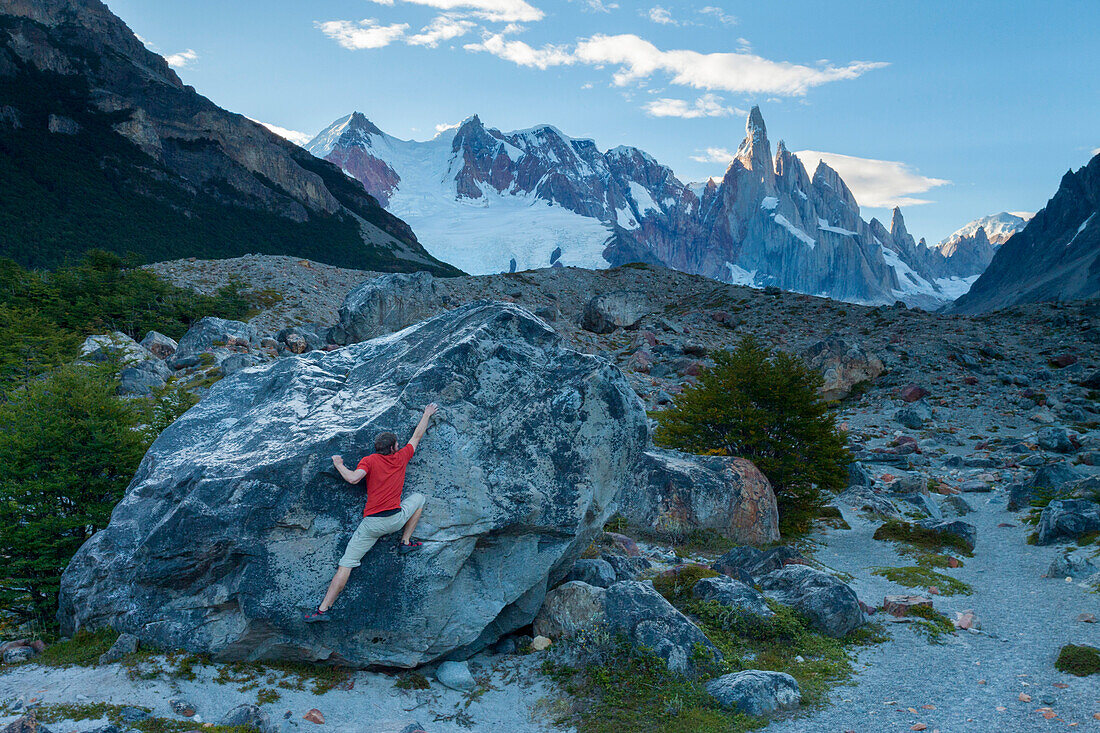 A man bouldering below Cerro Torre near Laguna Torre in Argentina's Los Glaciers National Park.