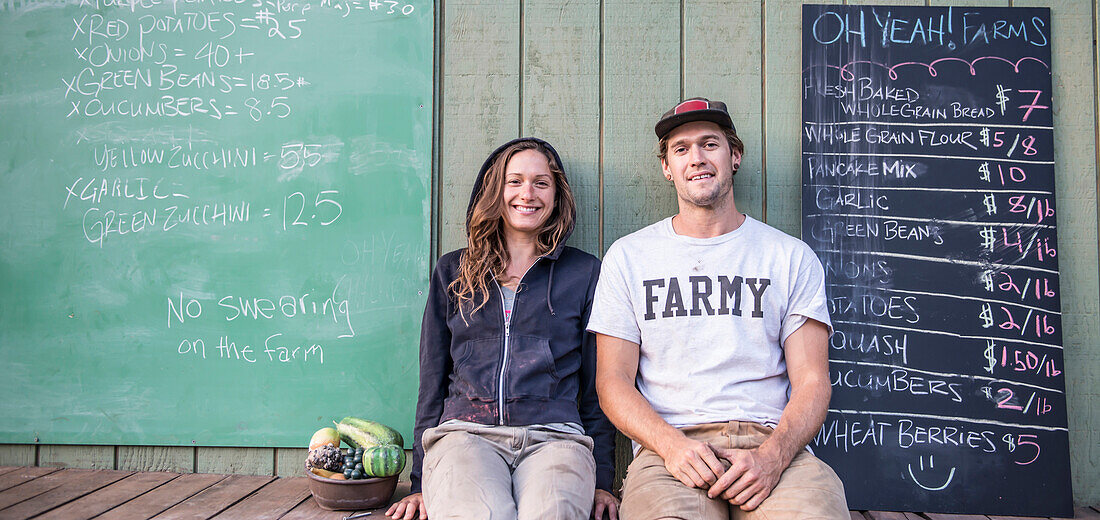 Chris Petry and Natalie Thompson, owners of Oh Yea Orgainic Farms take a break from harvest.