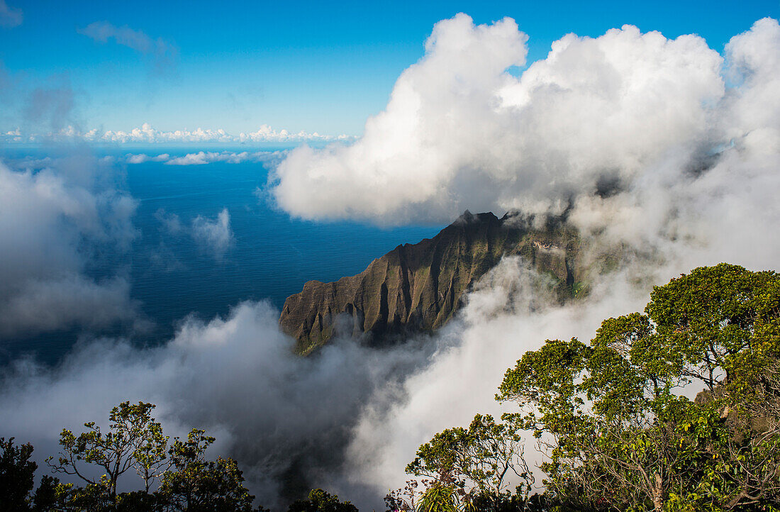 'A spectacular view materializes out of the mist; Kalalau, Kauai, Hawaii, United States of America'