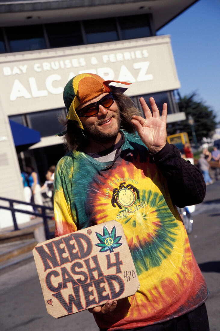 Hippy In Tie Dye Shirt Holding A Sign 'need Cash 4 Weed', San Francisco, California