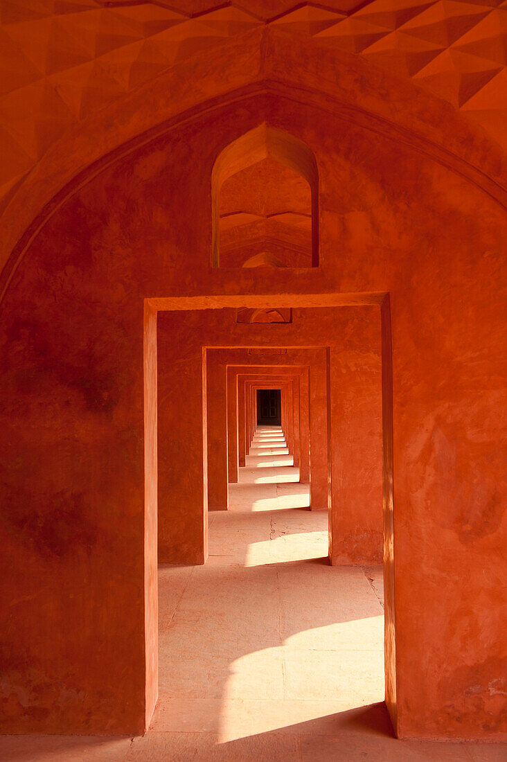 Corridor of sandstone in buildings beside the Taj Mahal, Agra, India.