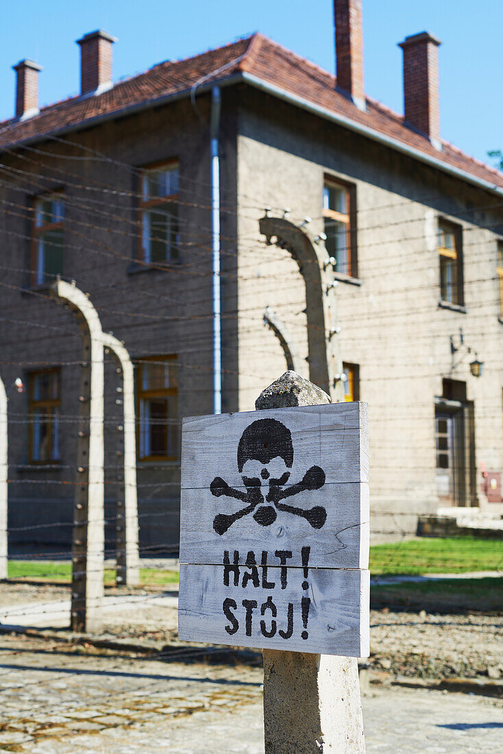 'Danger sign in Auschwitz concentration camp; Osweciem, Poland'