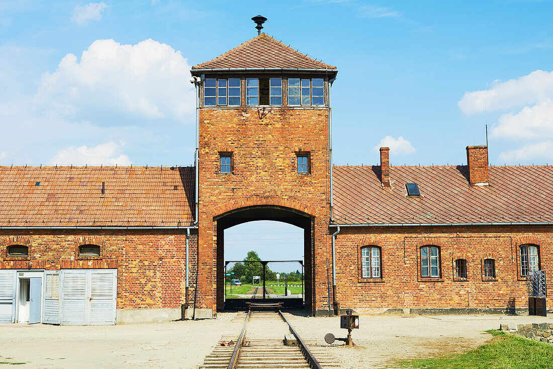 'Main entrance of Birkenau death camp viewed from inside front gate; Osweciem, Poland'