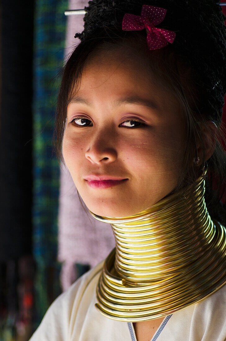 'Portrait of a woman from the Long Neck Karenni hill tribe; Thaton, Chiang Rai, Thailand'