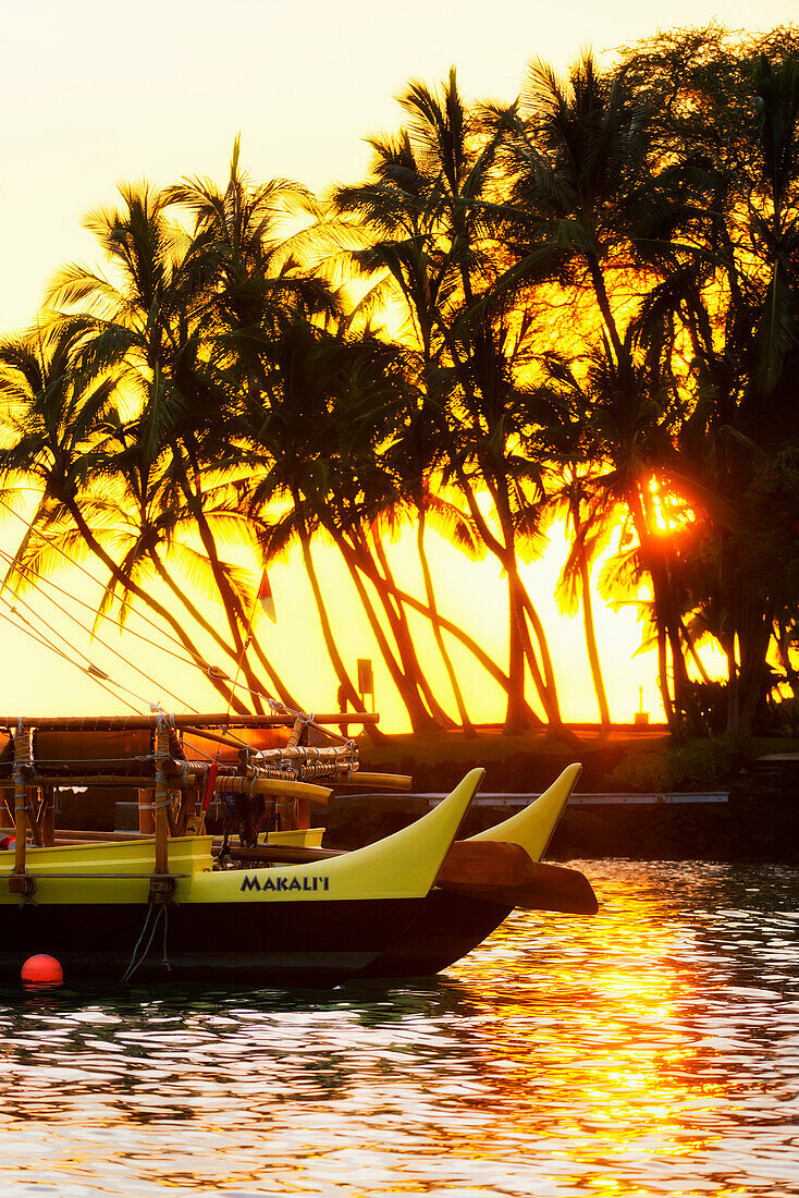 'Makali'i double hull canoe at sunset, Keauhou Bay; Big Island, Hawaii, United States of America'