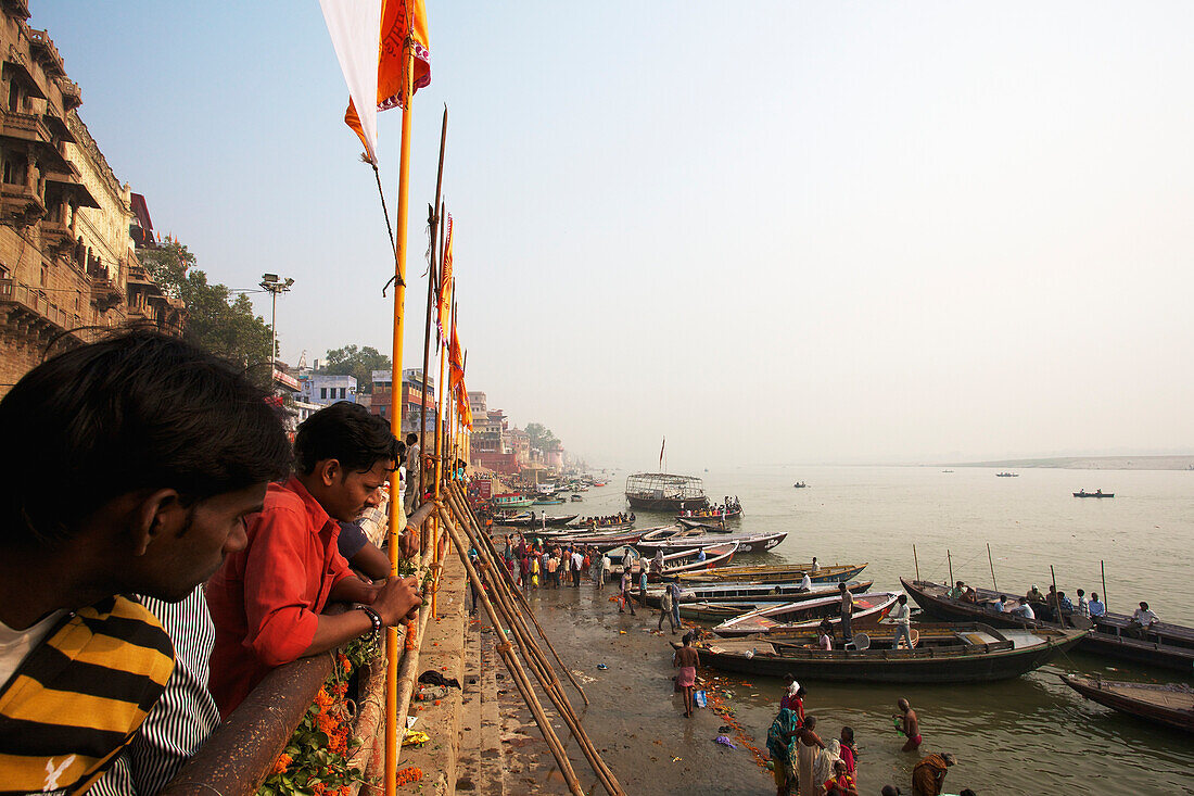 'Pilgrims at the ghats on the ganges; Varanasi, India'