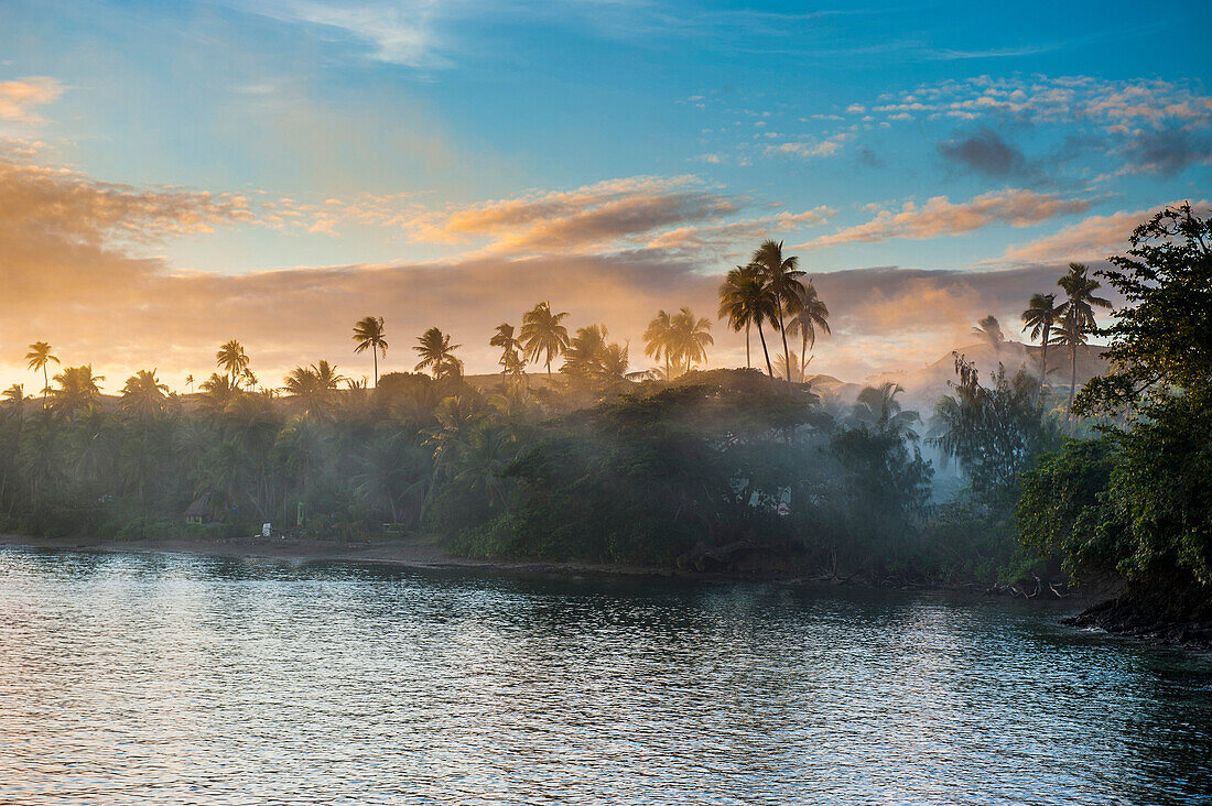 Sunset over the beach of Safe Landing resort, Nacula Island, Yasawas, Fiji, South Pacific, Pacific