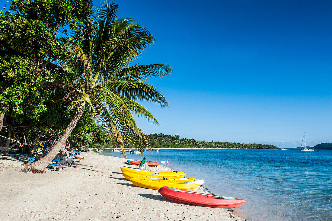 Kayaks on the white sand beach of Nanuya Lailai island, the blue lagoon, Yasawas, Fiji, South Pacific, Pacific