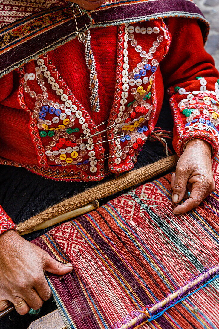 Quechua woman weaving a traditional textile, Cuzco, Peru, South America