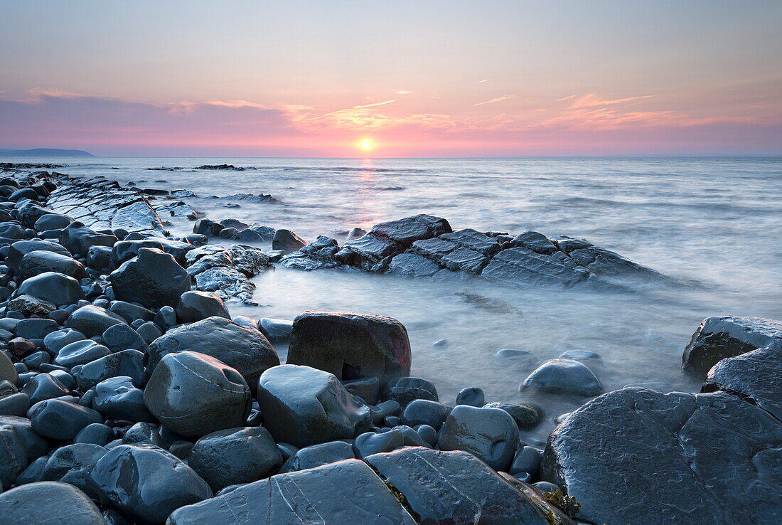 Sunset over the Bristol Channel from Kilve Beach, Somerset, England, United Kingdom, Europe