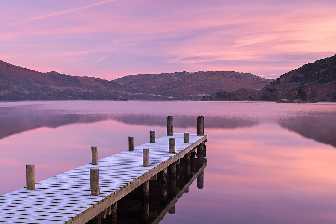 Frosty wooden jetty on Ullswater at dawn, Lake District National Park, Cumbria, England, United Kingdom, Europe