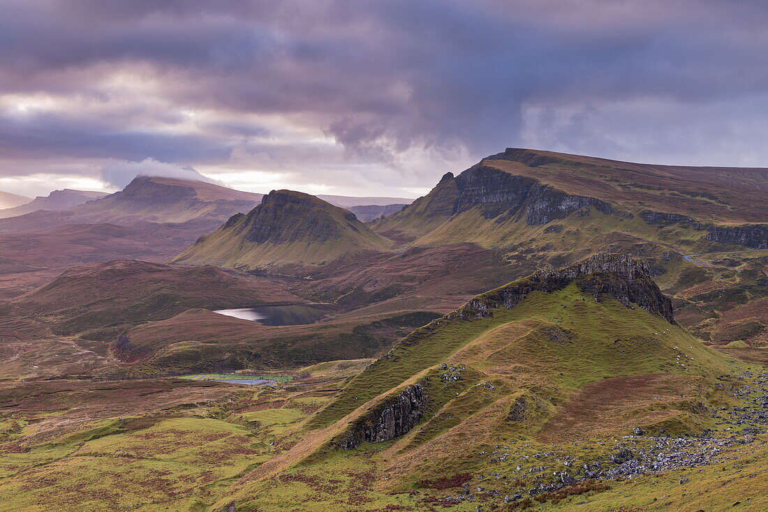 Dawn over the Trotternish mountain range, viewed from the Quiraing, Isle of Skye, Inner Hebrides, Scotland, United Kingdom, Europe