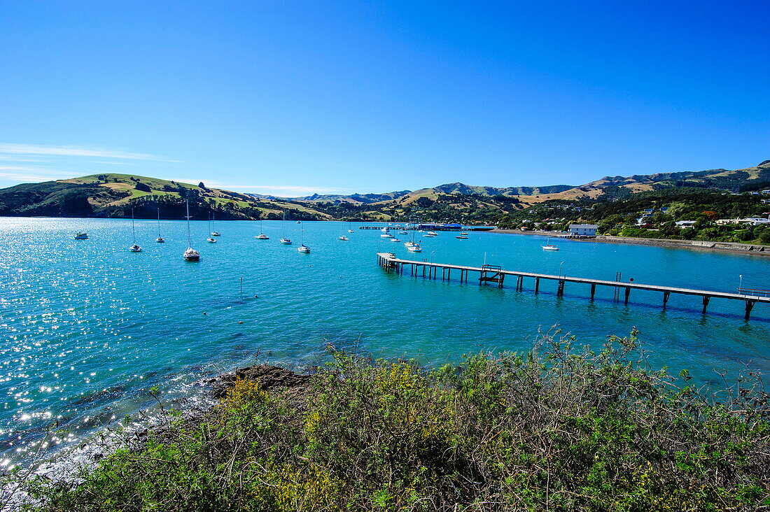 Little boats in the Akaroa harbour, Banks Peninsula, Canterbury, South Island, New Zealand, Pacific