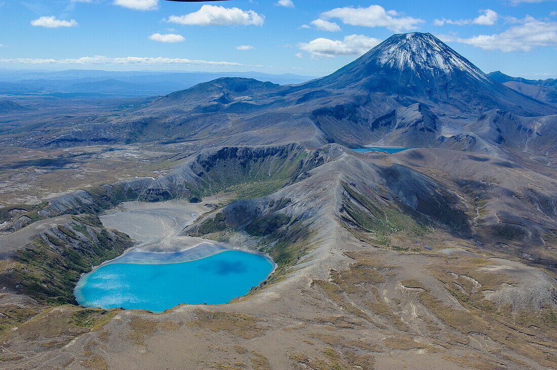 Aerial of the blue lake before Mount Ngauruhoe, Tongariro National Park, UNESCO World Heritage Site, North Island, New Zealand, Pacific