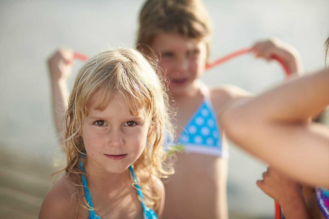 Girl looking at camera, lake Starnberg, Upper Bavaria, Bavaria, Germany