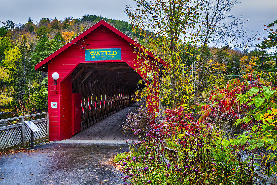 The covered bridge over the Gatineau River at Wakefield, Quebec, Canada