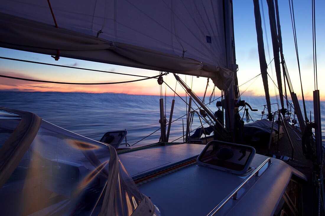 Sailing boat, yacht at dawn on the Atlantic ocean, Sailing