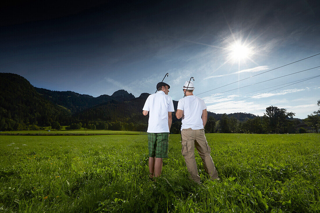 Urban golf players on a meadow, Wendelstein, Upper Bavaria, Germany