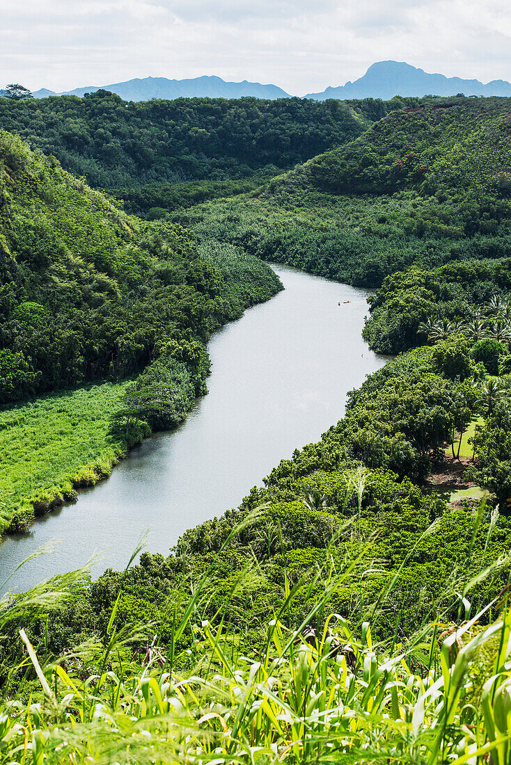 'The Wailua River flows to the Pacific ocean; Kauai, Hawaii, United States of America'