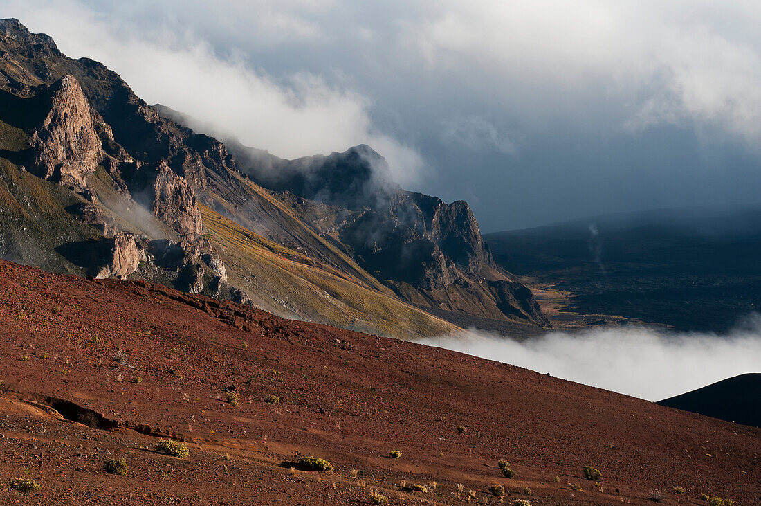 'Morning clouds begin to burn off of Haleakala National Park; Maui, Hawaii, United States of America'