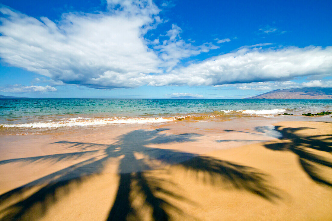 Hawaii, Maui, Wailea, Keawakapu Beach, Palm tree shadows on the beach.