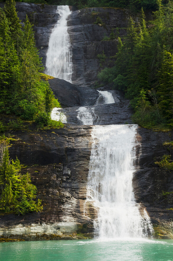 'Waterfall emptying into Endicott Arm, fjord in Tracy Arm-Fords Terror Wilderness, South of Juneau; Alaska, United States of America'