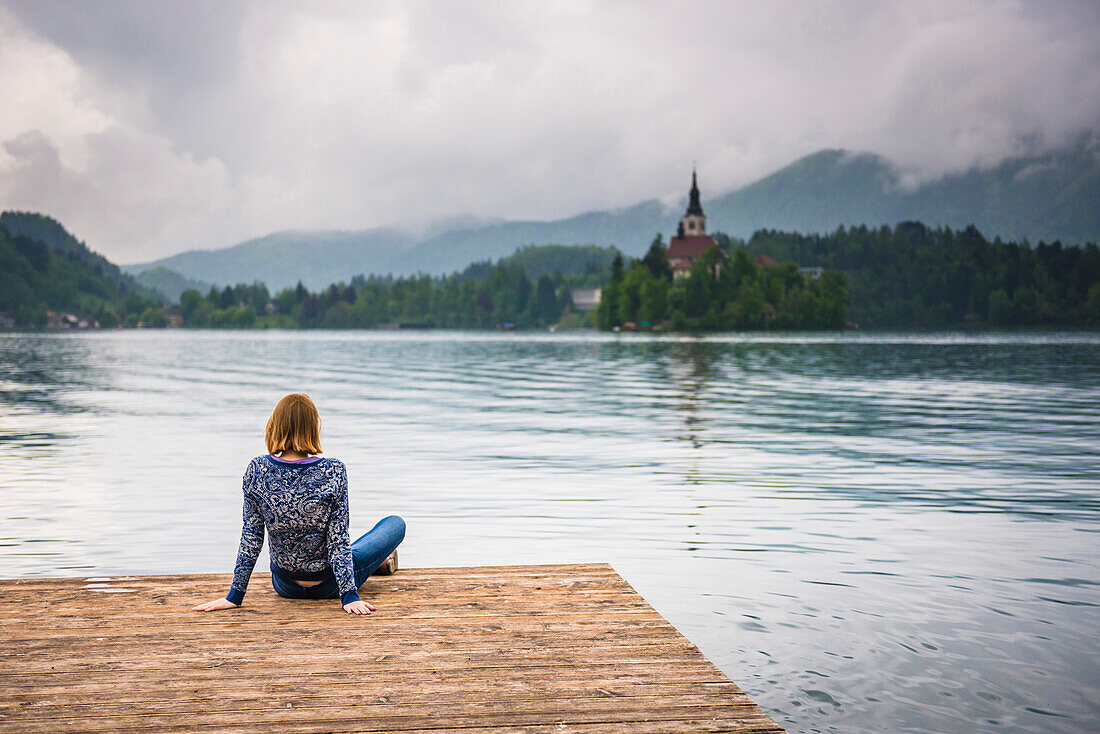 Woman looking at view, Lake Bled, Julian Alps, Gorenjska, Slovenia, Europe