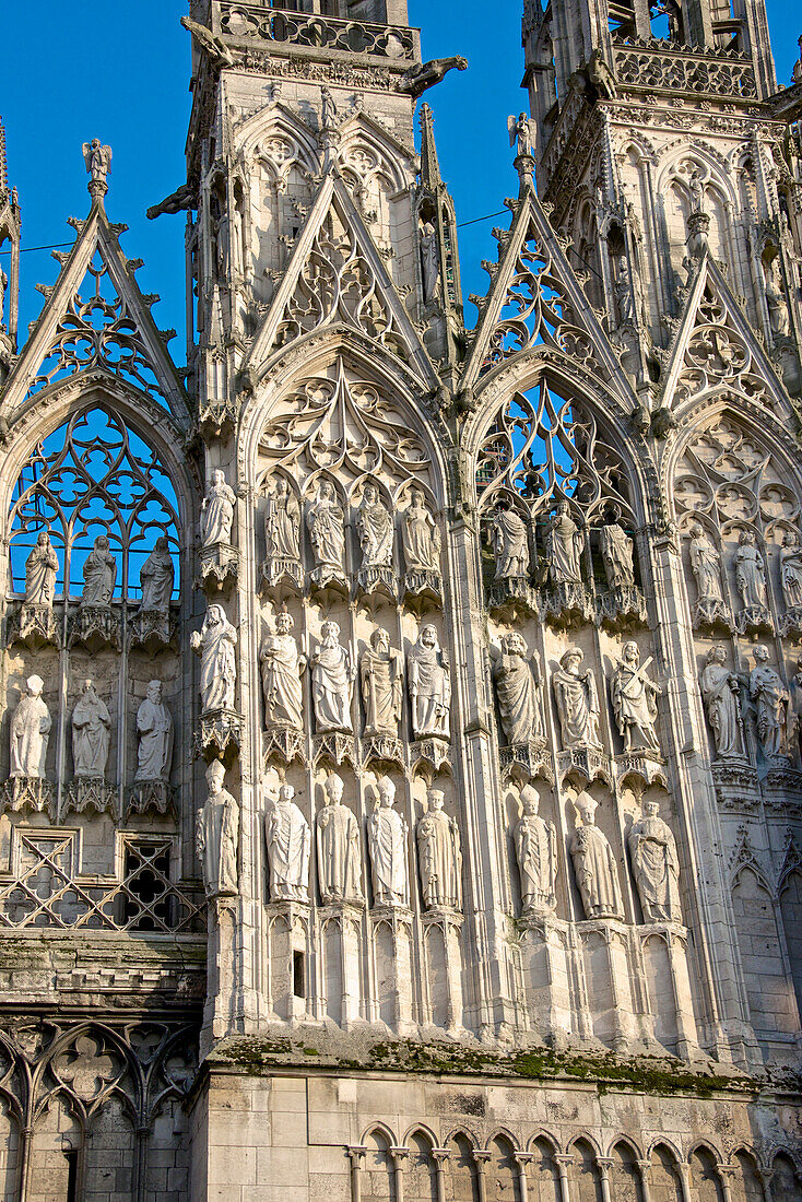 Stone statues of prophets, apostles, and archbishops, central doorway, western facade, on exterior of Cathedral Notre Dame dating from the 12th century, Rouen, Upper Normandy, France, Europe