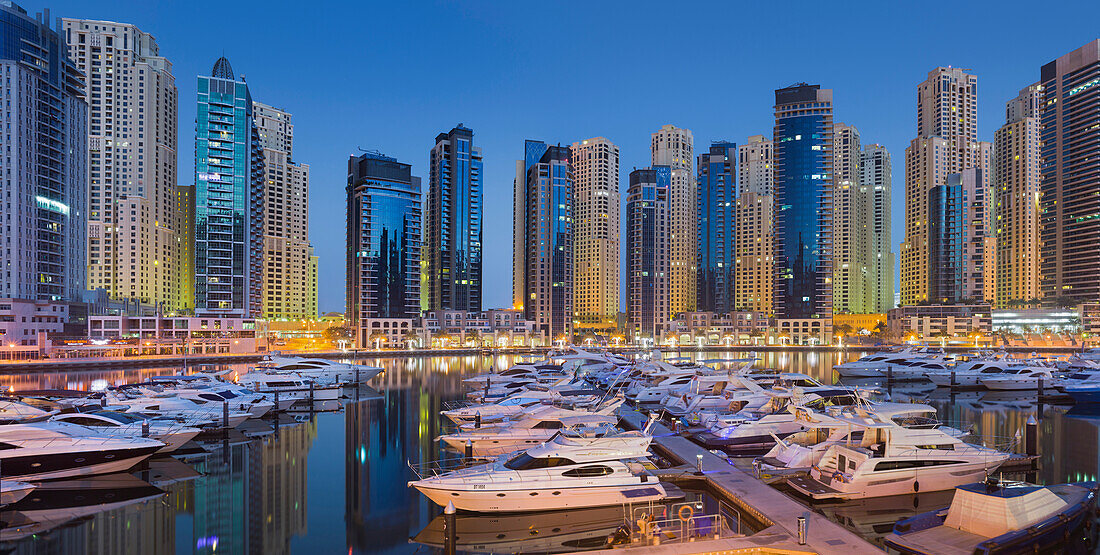 Yachts in the harbour at Dubai Marina and skyscrapers, Dubai, Unites Arab Emirates, UAE