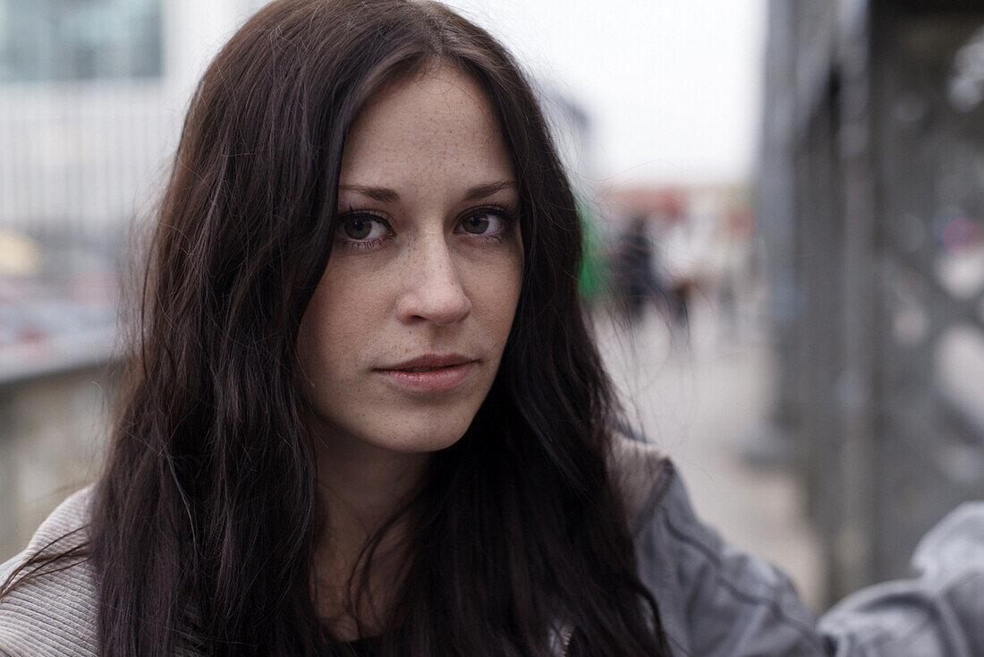 Young woman looking at camera, Munich, Bavaria, Germany