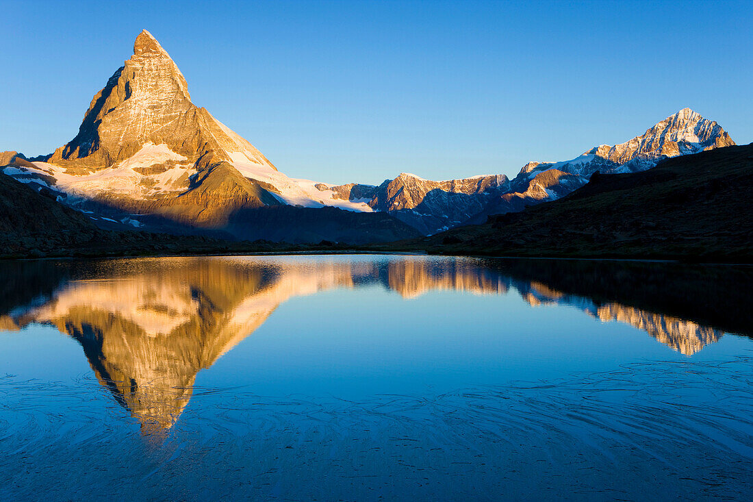 Lake Riffel, Switzerland, Europe, canton Valais, Mattertal, lake, sea, water plants, mountain, Matterhorn, reflection, morning mood