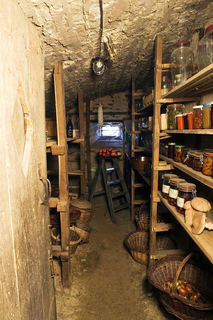 A rustic storage room with shelves