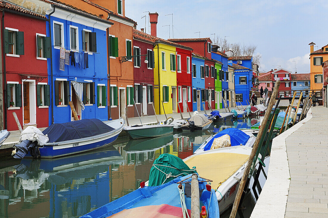 Colorful houses alongside canal, Burano, near Venice, Veneto, Italy, Europe.