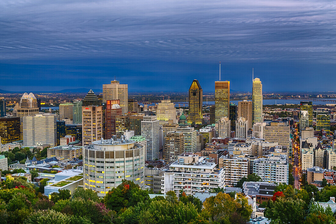 The downtown city skyline of Montreal, Quebec, Canada at dusk.