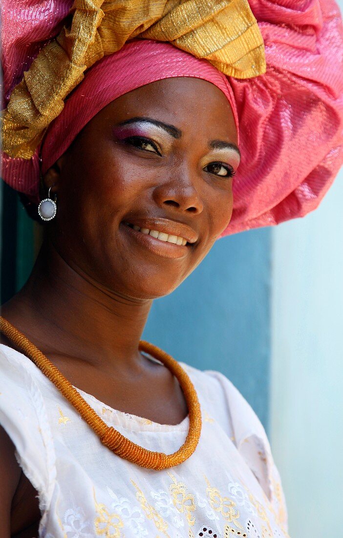 Portrait of a Bahian woman in traditional dress at the Pelourinho district, Salvador, Bahia, Brazil