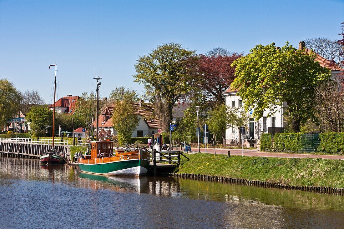 Sailboat in the historic harbor of Carolinensiel in East Frisia, Lower Saxony, Germany, Europe