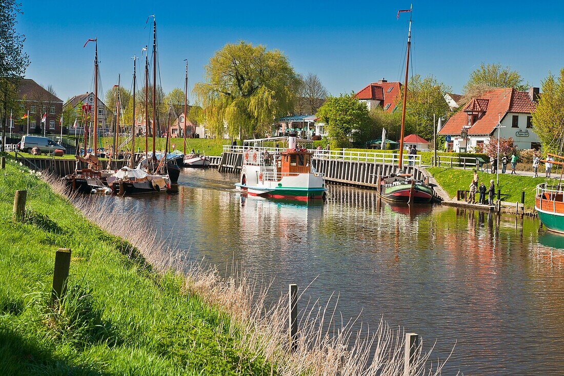 A steam boat replica in the historic harbour of Carolinensiel, East Frisia, Lower Saxony, Germany, Europe