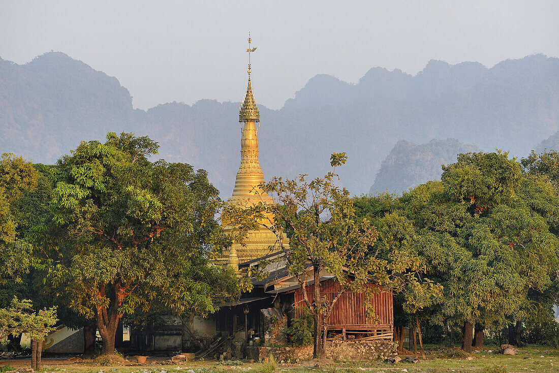 Myanmar, Kayin (Karen) State, Hpa-An, Surroundings of Kyauk Kalap pagoda, Golden stupa.