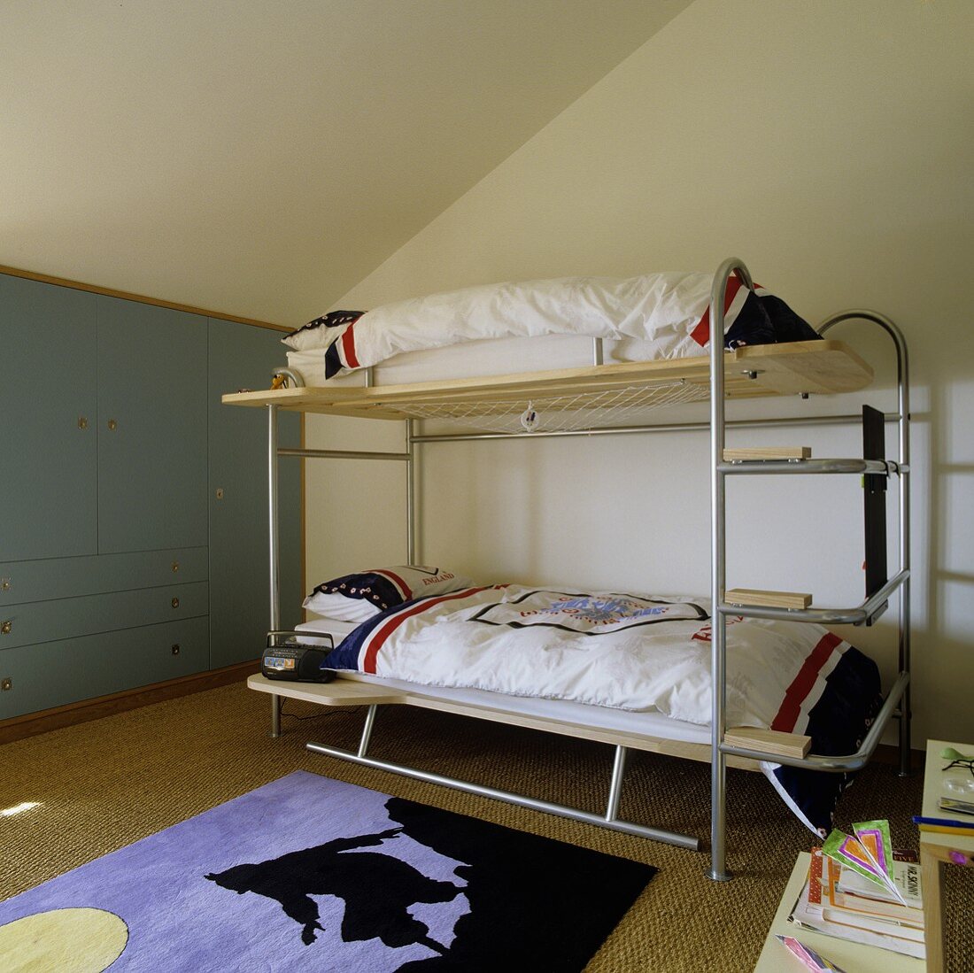 A lightweight bunk bed under a slopping roof