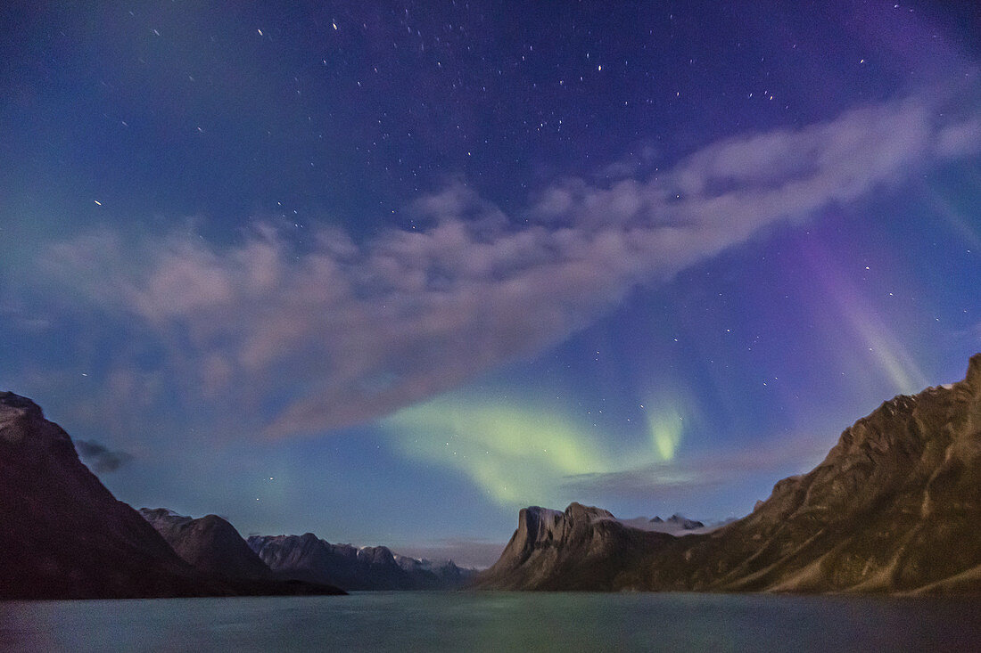 The aurora borealis from the bow of the National Geographic Explorer in Kangerlussuaq Fjord, Greenland.