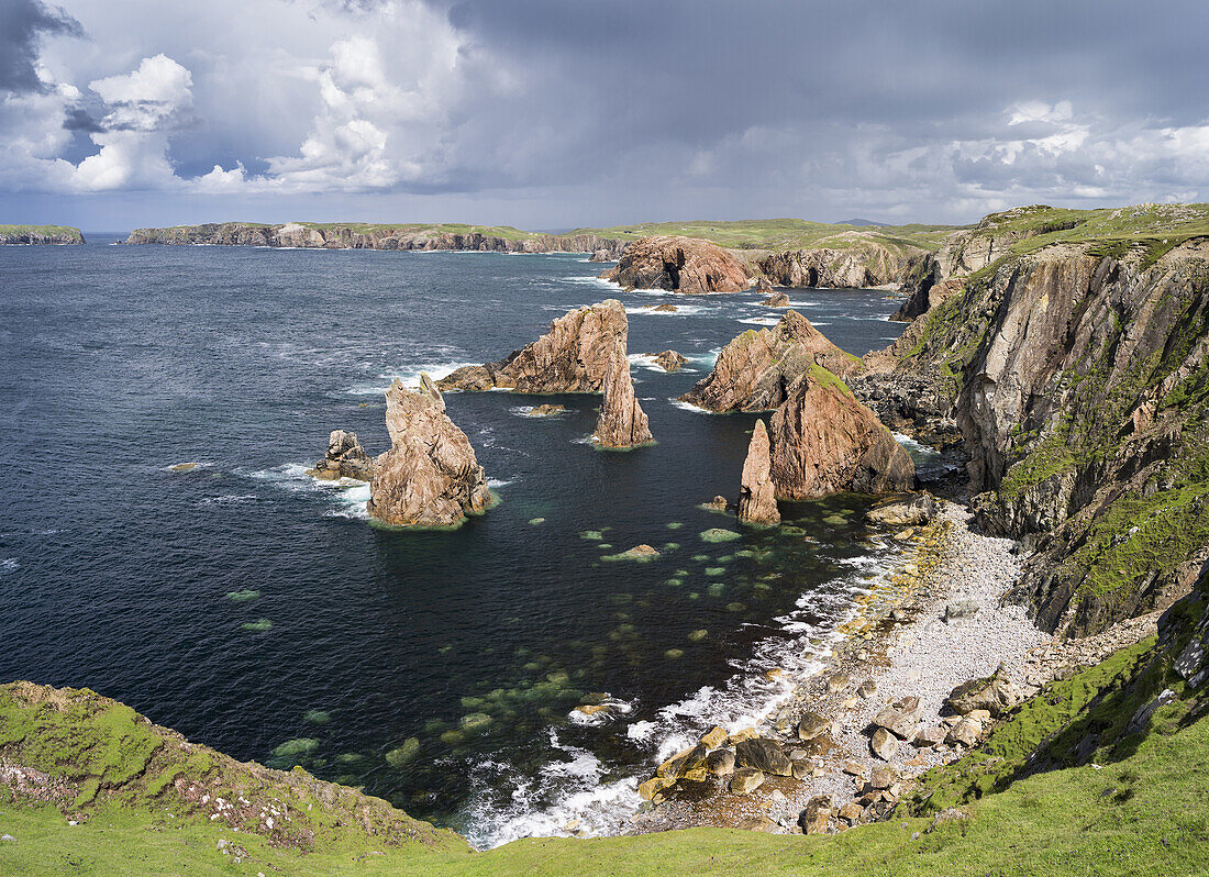 Isle of Lewis, part of the island Lewis and Harris in the Outer Hebrides of Scotland. The cliffs and sea stacks near Mangersta (Mangurstadh) in Uig. Europe, Scotland, July.
