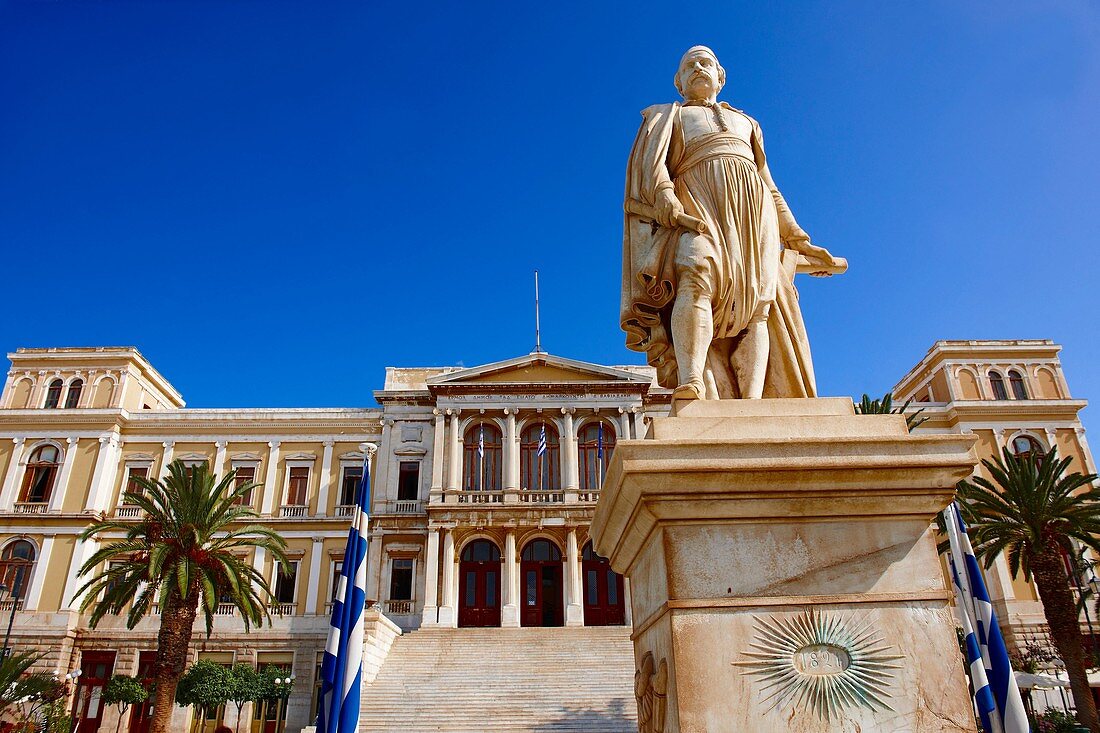 Statue of Andreas Miaoulis, celebrated admiral of the Greek War of Independence, and the Neo Classic City Hall of Ermoupolis, Miaoulis Square, Syros  S  , Greek Cyclades Islands