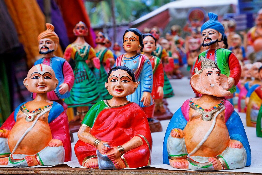 Market stall selling papier mache figures, Anjuna Market, Goa, India