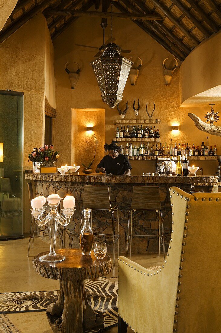 A living room with a bar in a South African house