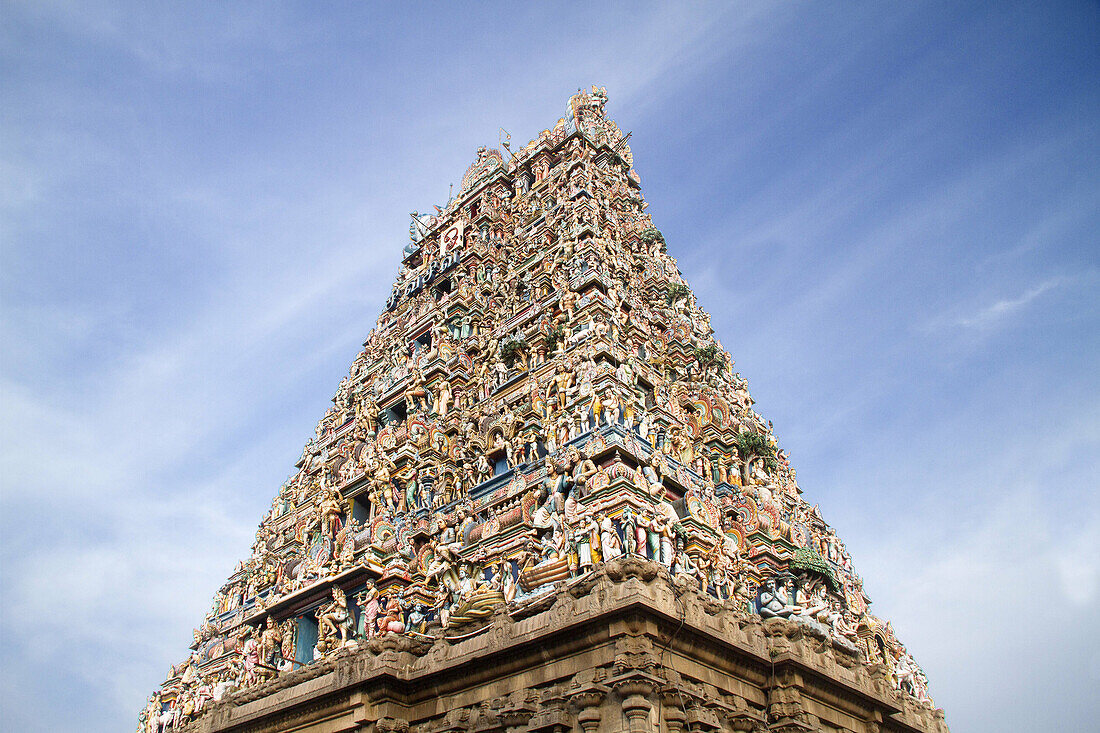 Tower (gopuram) of the Kapaleeswarar Temple covered with designs and scultures.Mylapore, India.
