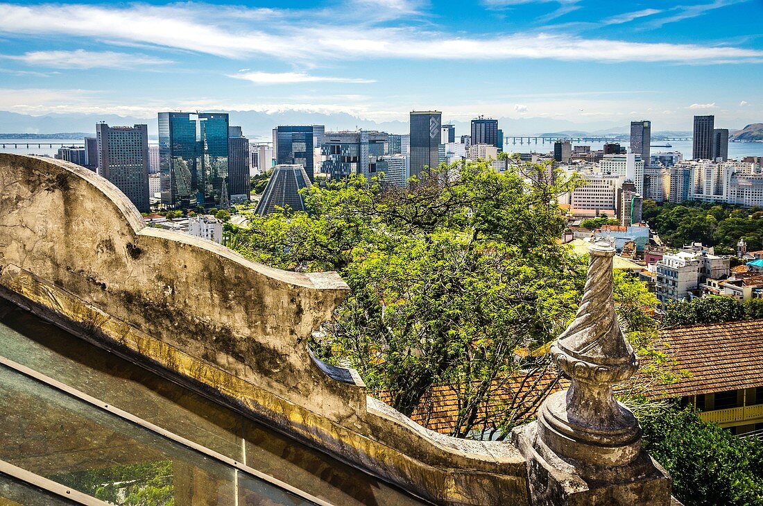 The contrast between an historic building (Ruins Park) and modern skycraper in Rio de Janeiro, Brazil.