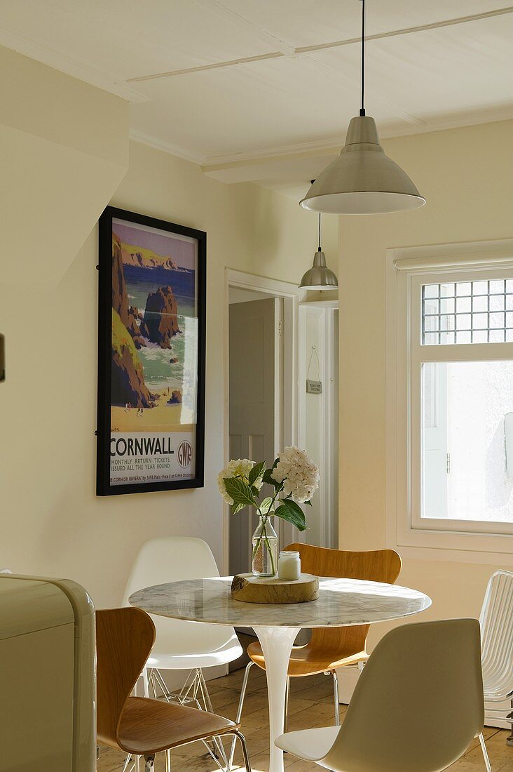 A Bauhaus-style dining table with chairs