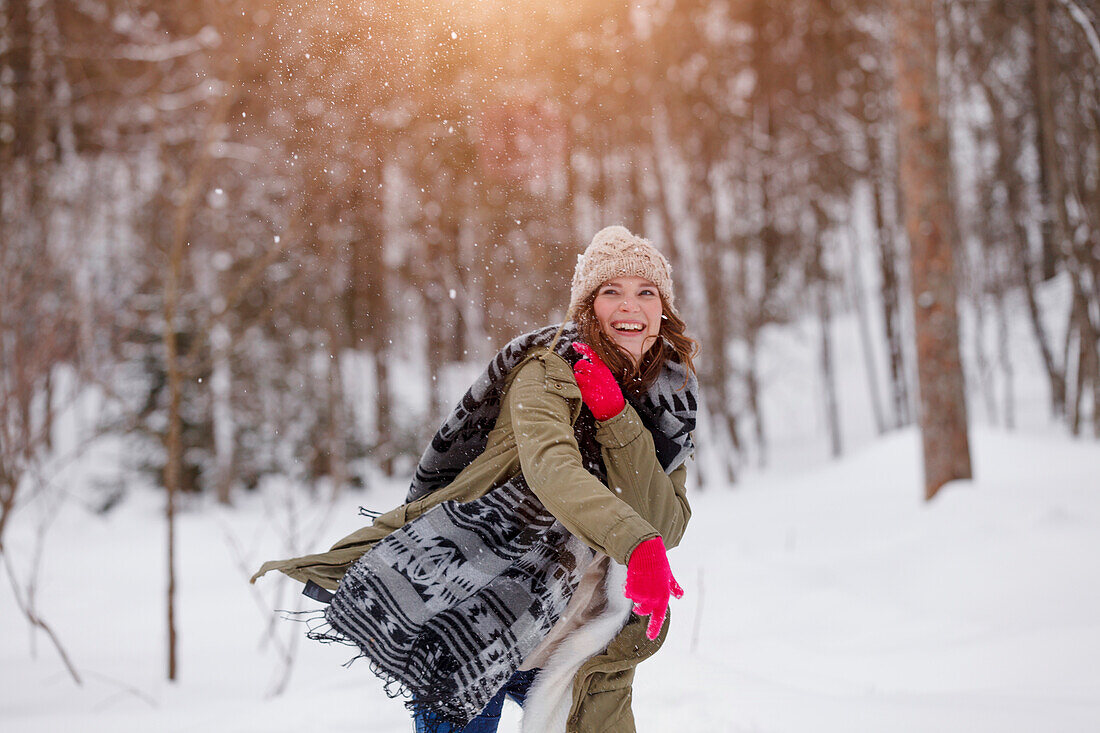 Young woman in snown, Spitzingsee, Upper Bavaria, Germany